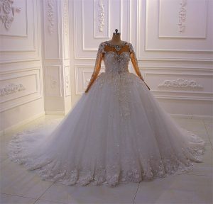 Real luxurious 3D Swarovski beaded high end long sleeve skin colour wedding dress