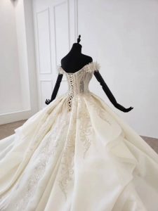 Off shoulder full beaded luxurious empire wedding dress - Image 2