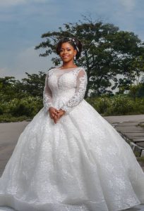 Chantilly Lace beaded long sleeve empire wedding dress
