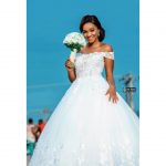 Off shoulder beaded cap sleeve empire wedding dress