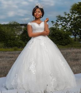 Off shoulder sweetheart cut beaded empire wedding dress - Image 2